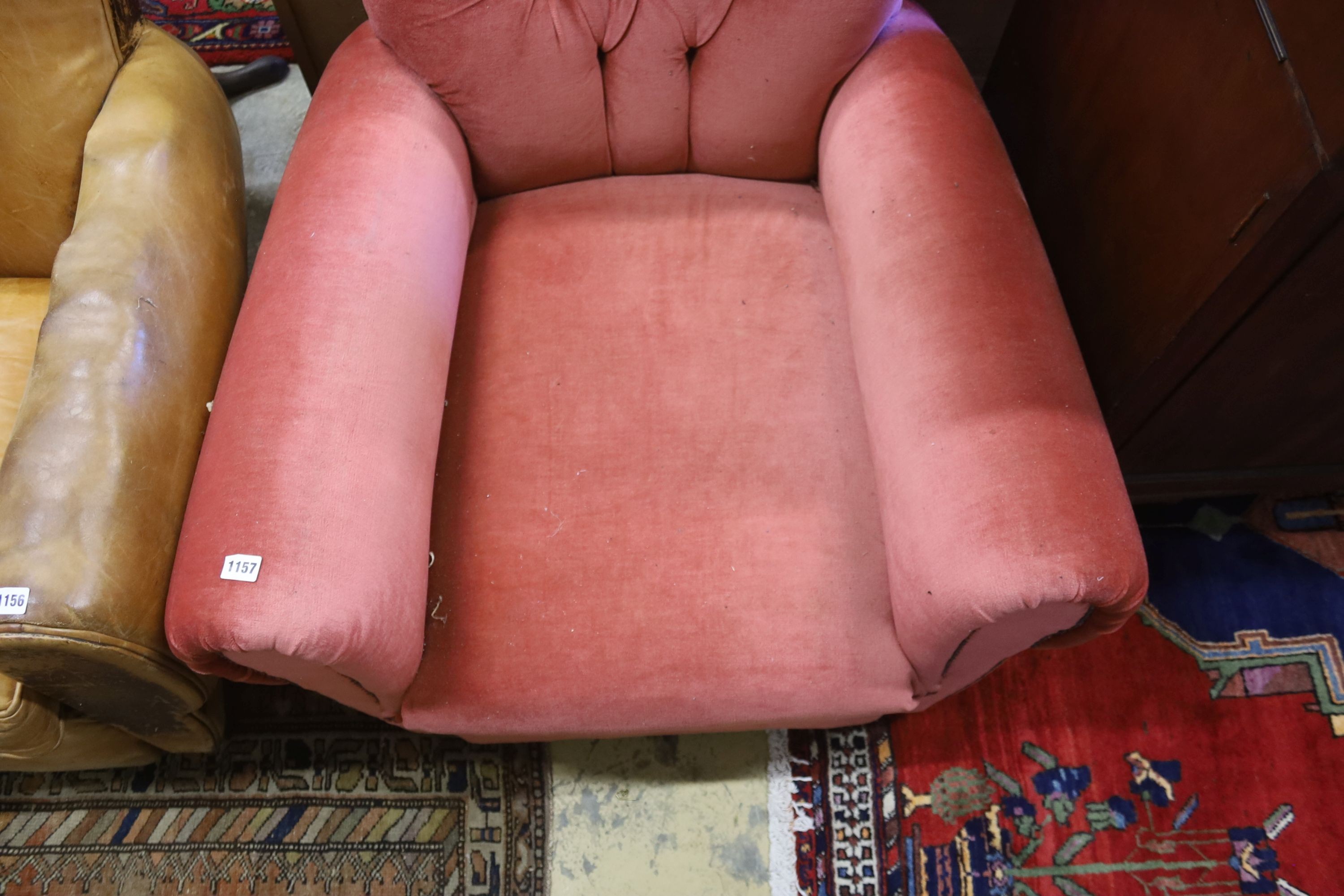 An early 20th century French armchair re-upholstered in pink dralon, width 86cm, depth 84cm, height 77cm